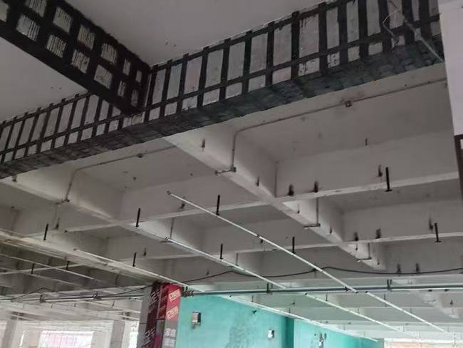 河池结构加固公司在结构加固改造中碳纤维粘钢加固的复合应用案例